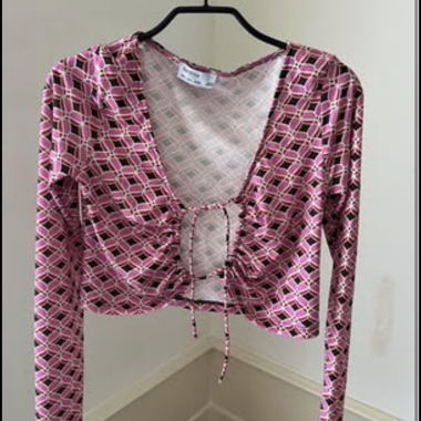 Crop top rosa a manica lunga
