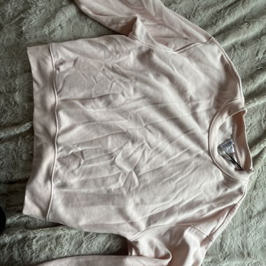 Maglione rosa chiaro