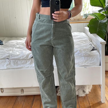 Green corduroy straight leg trousers 
