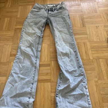 Acid-wash flared jeans