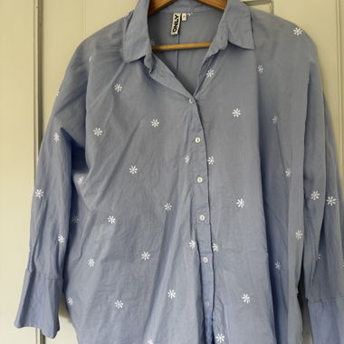 ONLY light blue shirt