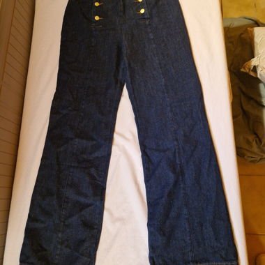 Jeans a gamba larga con vita alta