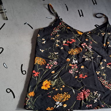 Black top with flower prints
