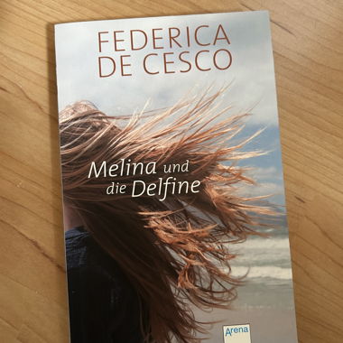 Melina e i delfini