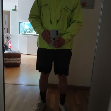 Neon yellow Supreme hooded jacket