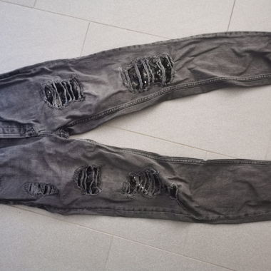 Schwarze Ripped Skinny Jeans