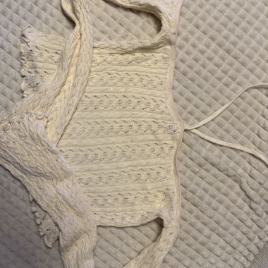 Crocheted cream crop top