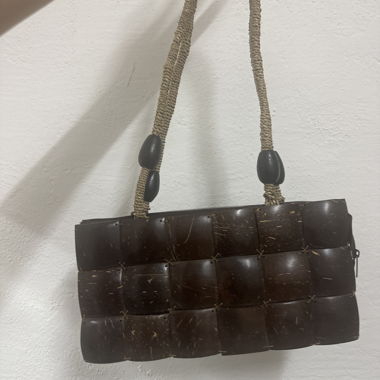 Woven handbag made from coconut material