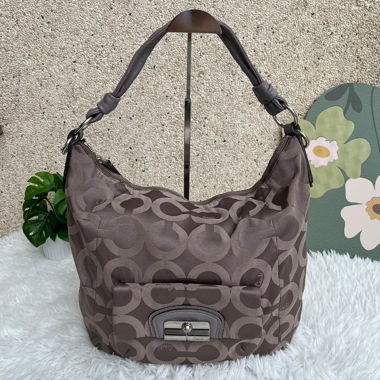 Borsa a tracolla Coach marrone rosa, medium