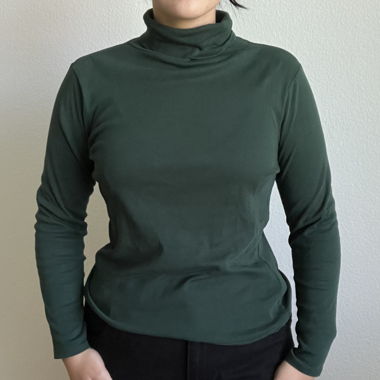 Dunkelgrüner Rollkragen Pullover