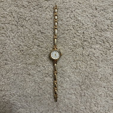Montre-bracelet pour femme dorée
