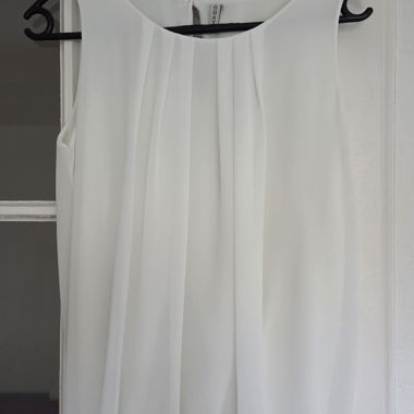 White Sleeveless Blouse