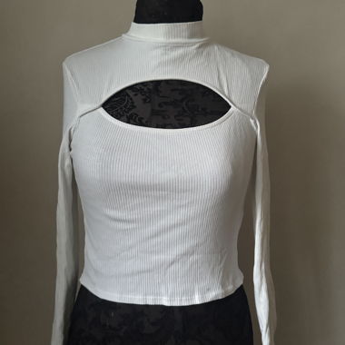 White ribbed long-sleeve top with cut-out
