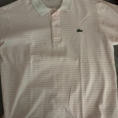 Polo Lacoste rosa chiaro