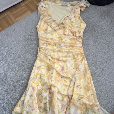 Yellow floral dress with ruffles
