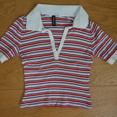 Polo a righe bianche