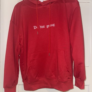 Felpa con cappuccio rossa con stampa "Du bist genug."