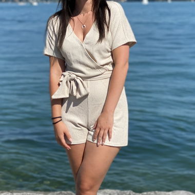 Beige short jumpsuit with golden shimmer