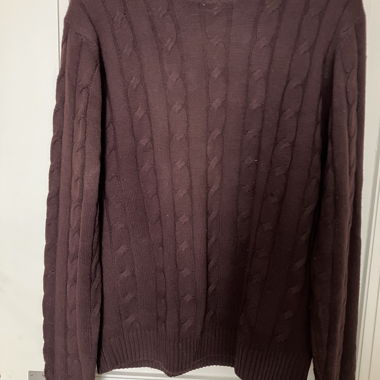 Maglione lilla a trecce