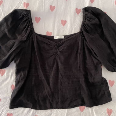 Black top with puff sleeves