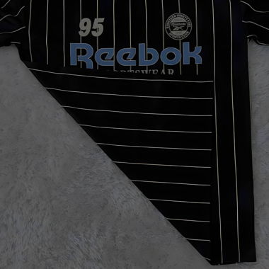 Maillot de sport rayé Reebok