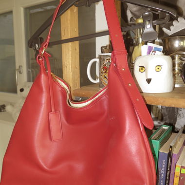 Red faux leather bag