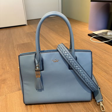 Blauer Top-Handle-Beutel