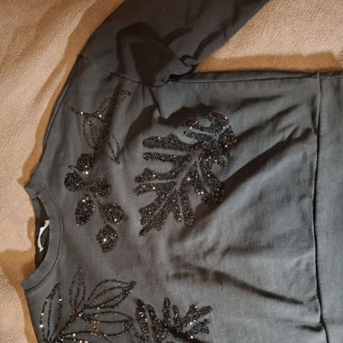 Pull à paillettes en M