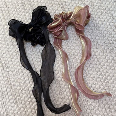 Fiocchi per capelli con nastro nero e rosa