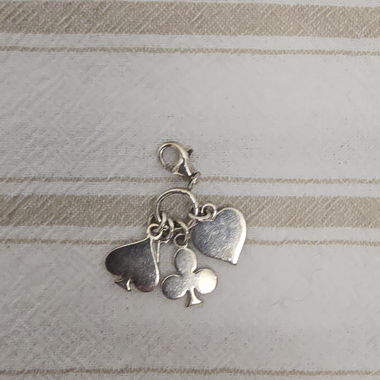 Silver card-symbol pendant