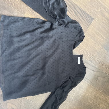 Schwarze Volant-Bluse