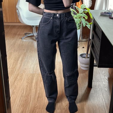 Dark wash high waisted jeans with ripped knees