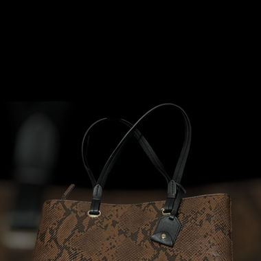 Schlangenmuster Handtasche 