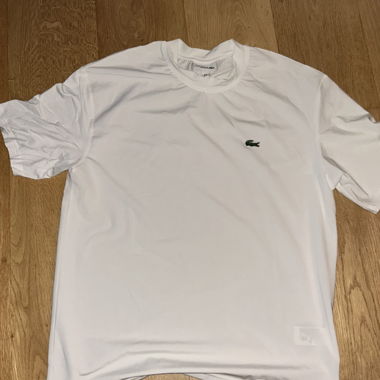 T-shirt bianca Lacoste in tessuto a maglia