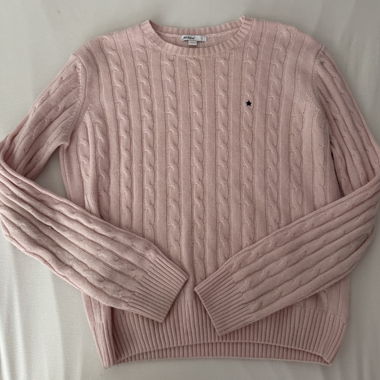 Maglione rosa a trecce