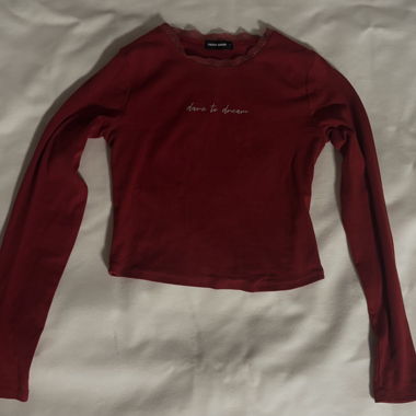 Red long-sleeve top with lace