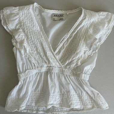 Blusa bianca a maniche corte