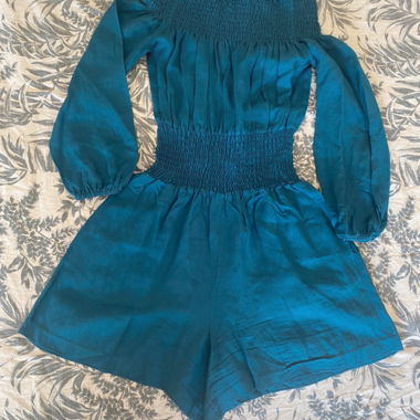 Short blue jumpsuit for women