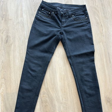 Pantalon noir enduit