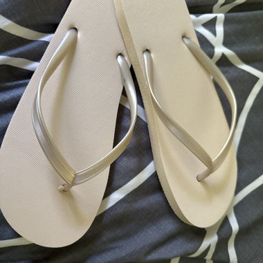 Beige flip-flops