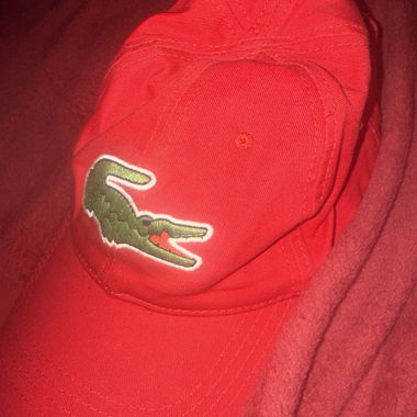 Cappellino rosso Lacoste