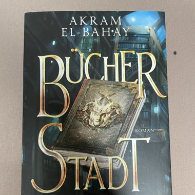 Bücher Stadt - Akram El Bahay