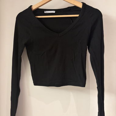 Top corto nero a maniche lunghe