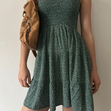 Vestito estivo verde con motivo floreale