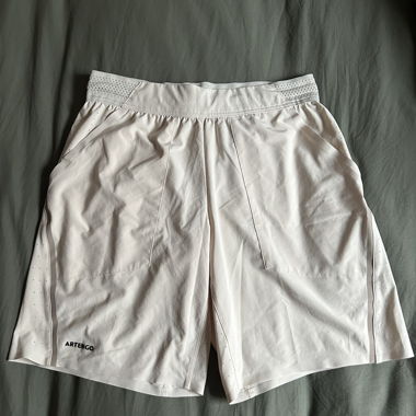 Cream Artengo sports shorts