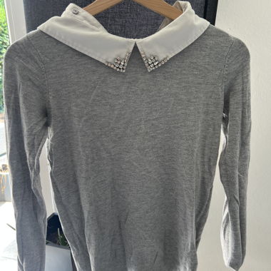 Pull encolure fantaisie 