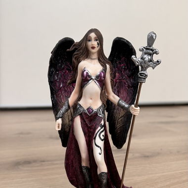 Fantasy figure with wings and magic wand