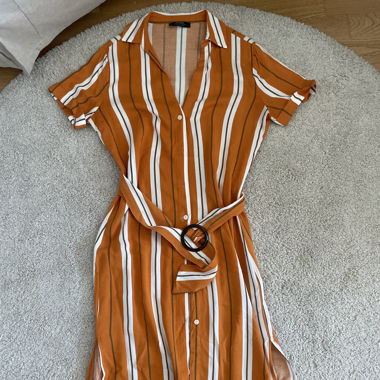 orange dress with white and khaki stripes