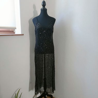 Abito nero trasparente con paillettes