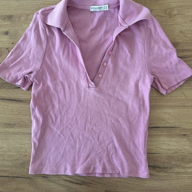 Pink ribbed & cropped polo top from stradivarius 
